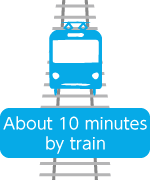 About 10 minutes by train